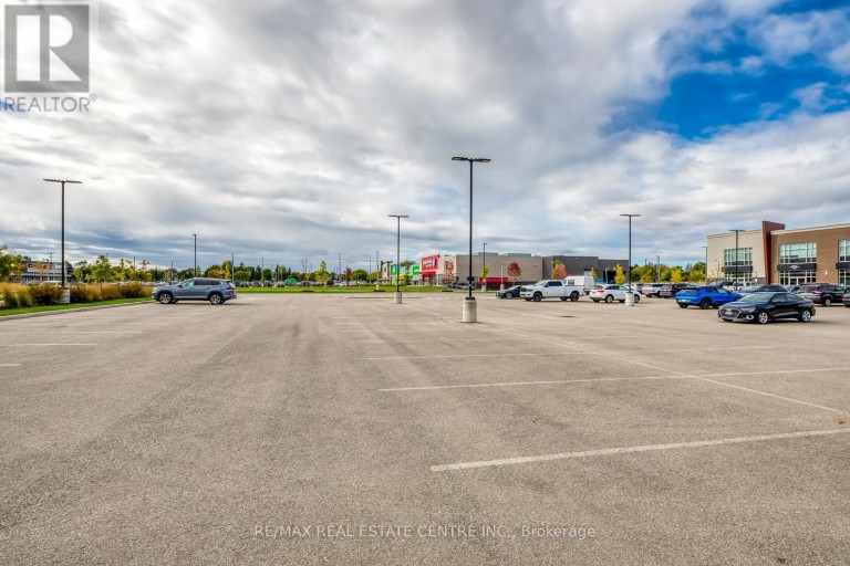 211 - 3475 REBECCA STREET, Oakville (QE Queen Elizabeth), Ontario, L6L0H3