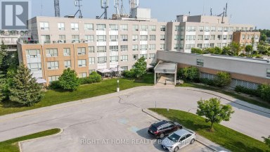 410 - 90 DEAN AVENUE Barrie (Painswick South) Ontario photo 2