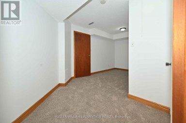 LOWER - 20 BUSH DRIVE Toronto (Highland Creek) Ontario photo 9