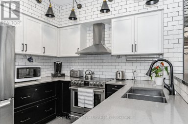 102 - 308 WATSON PARKWAY N Guelph (Grange Road) Ontario photo 1