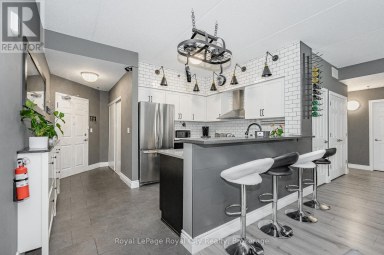 102 - 308 WATSON PARKWAY N Guelph (Grange Road) Ontario photo 3
