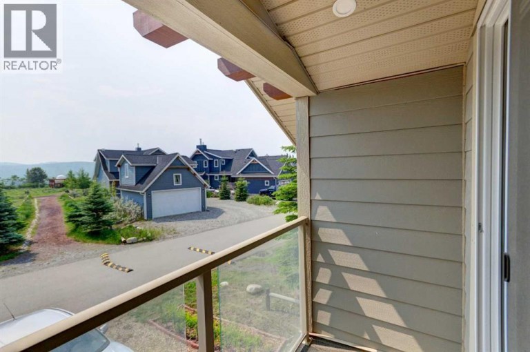 301 Cottageclub Green, Rural Rocky View County, Alberta, T4C1B1