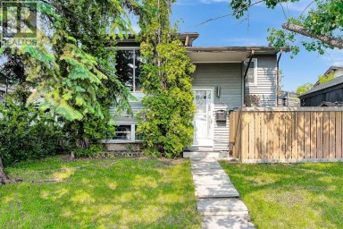 215 ERIN WOODS Drive SE Calgary Alberta photo 1