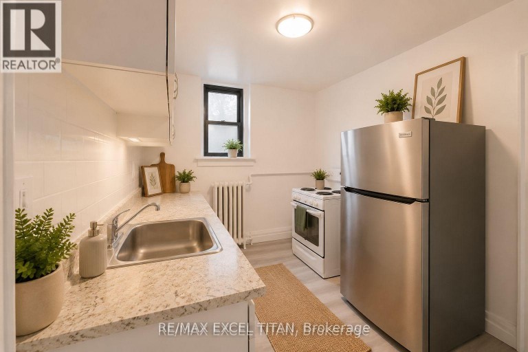 65 - 12 KINGSTON ROAD, Toronto (Woodbine Corridor), Ontario, M4L1S5