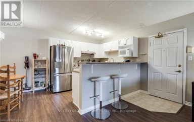 104 - 1411 WALKER'S LINE Burlington (Tansley) Ontario photo 1