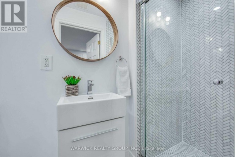 LOWER - 57 BERTMOUNT AVENUE, Toronto (South Riverdale), Ontario, M4M2X8