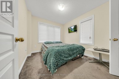87 - 88 DECORSO DRIVE Guelph (Kortright East) Ontario photo 14