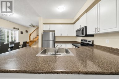 87 - 88 DECORSO DRIVE Guelph (Kortright East) Ontario photo 7