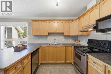 103, 128 Centre Avenue Cochrane Alberta photo 9