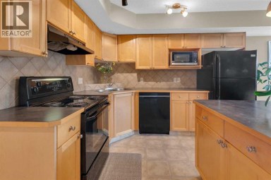 411, 140 Sagewood Boulevard SW Airdrie Alberta photo 11