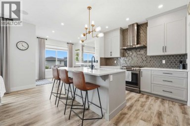411 Rivercrest Boulevard Cochrane Alberta photo 4