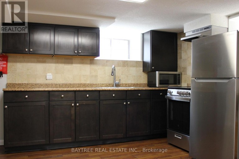 LOWER - 57 CARUS AVENUE, Toronto (Wychwood), Ontario, M6G2A5
