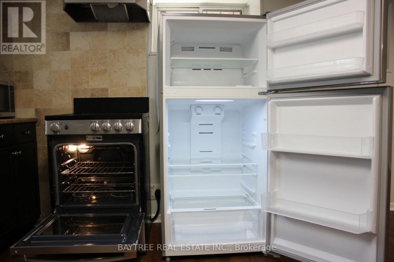 LOWER - 57 CARUS AVENUE, Toronto (Wychwood), Ontario, M6G2A5