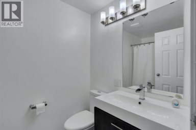 174 Woodmont Terrace SW Calgary Alberta photo 10
