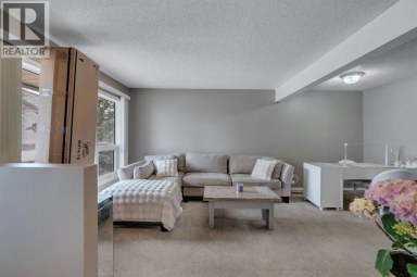 174 Woodmont Terrace SW Calgary Alberta photo 4