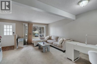174 Woodmont Terrace SW Calgary Alberta photo 8