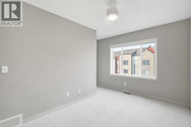 209 Copperpond Row SE Calgary Alberta photo 28
