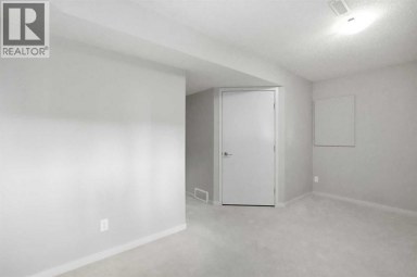 209 Copperpond Row SE Calgary Alberta photo 32