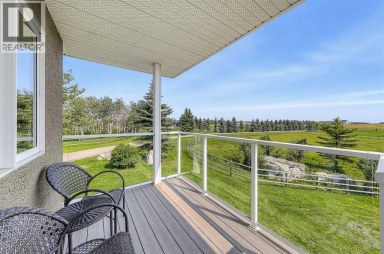 286027 11 Street W Rural Foothills County Alberta photo 24