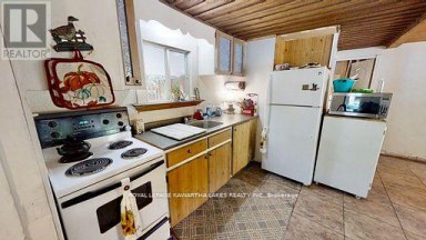 81 MCGUIRE BEACH ROAD Kawartha Lakes (Carden) Ontario photo 29