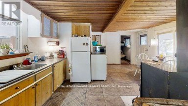 81 MCGUIRE BEACH ROAD Kawartha Lakes (Carden) Ontario photo 30