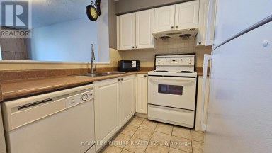 1212 - 1 LEE CENTRE DRIVE Toronto (Woburn) Ontario photo 7
