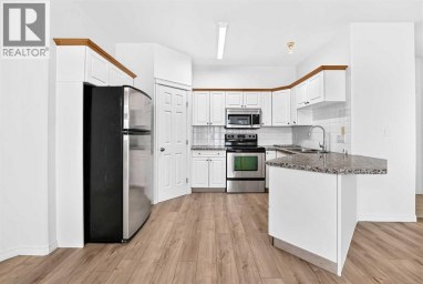 1315, 7451 Springbank Boulevard SW Calgary Alberta photo 4