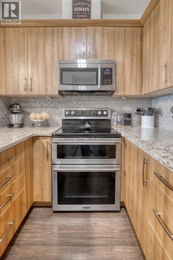 2203, 15 Sunset Square, Cochrane, Alberta, T4C0E7
