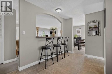 131 Cedarpark Drive SW Calgary Alberta photo 4