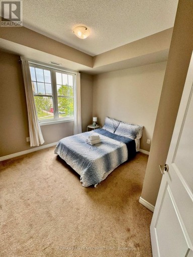 202 - 2339 SAWGRASS DRIVE, Oakville (RO River Oaks), Ontario, L6H0L1