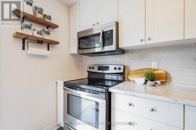 E4 - 63 FERRIS LANE Barrie (Cundles East) Ontario photo 6