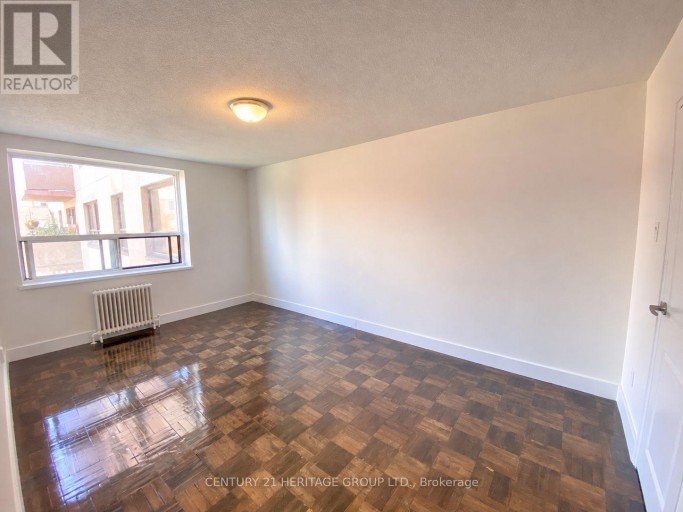 307 - 3101 EGLINTON AVENUE E, Toronto (Scarborough Village), Ontario, M1J2G4