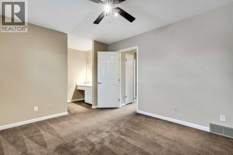 105, 107 Elm Place, Okotoks, Alberta, T1S1J1