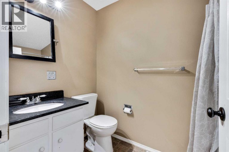 105, 107 Elm Place, Okotoks, Alberta, T1S1J1