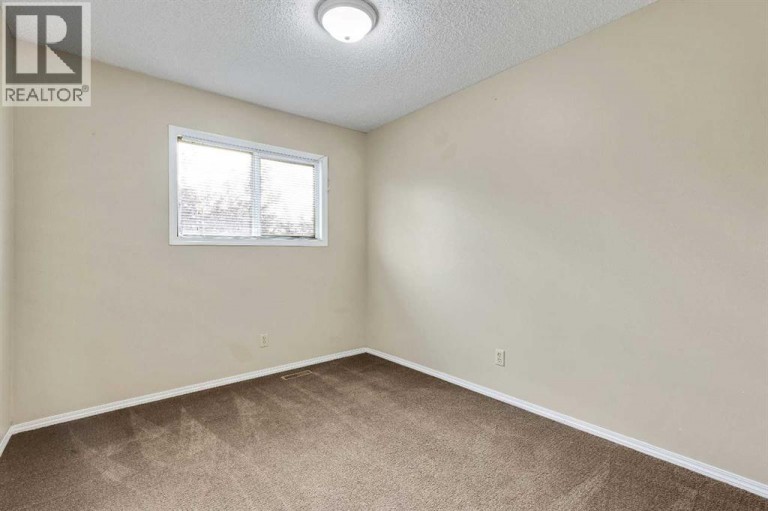 105, 107 Elm Place, Okotoks, Alberta, T1S1J1