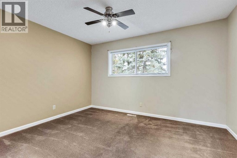 105, 107 Elm Place, Okotoks, Alberta, T1S1J1