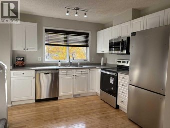 155 Tuscany Springs Gardens NW Calgary Alberta photo 7