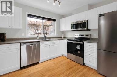 155 Tuscany Springs Gardens NW Calgary Alberta photo 8