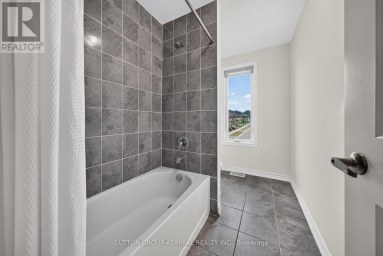 76 CALYPSO AVENUE Springwater (Midhurst) Ontario photo 35