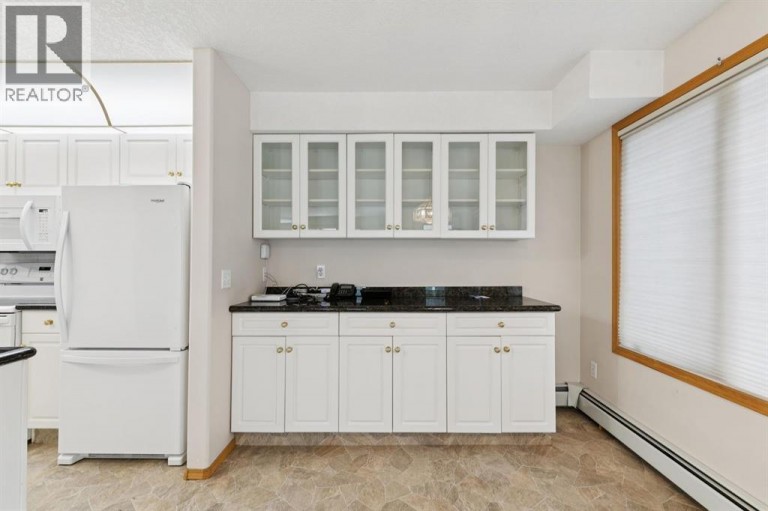 107, 7239 Sierra Morena Boulevard SW, Calgary, Alberta, T3H3L7