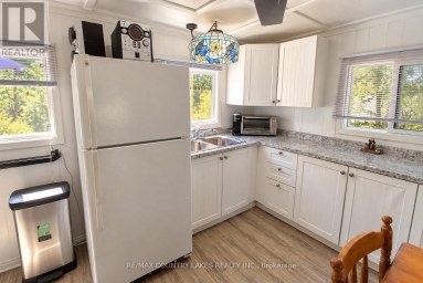 77 MCGUIRE BEACH ROAD Kawartha Lakes (Carden) Ontario photo 10