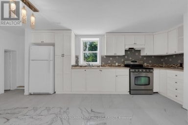 132 QUEEN STREET W Springwater (Elmvale) Ontario photo 8