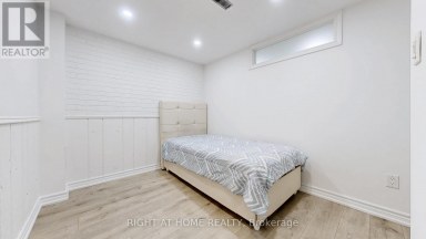 12A KENMORE AVENUE Toronto (Clairlea-Birchmount) Ontario photo 33